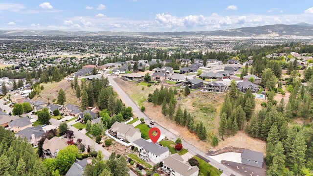 2716 S Man O War Ln, Veradale, WA 99037 - aerial overview of property's location featuring nearby suburban area and mountains