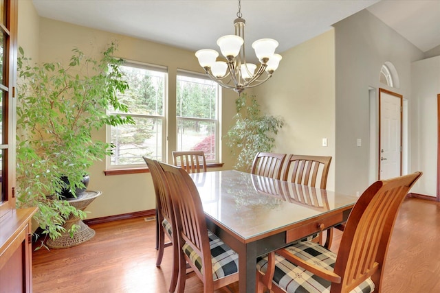 2716 S Man O War Ln, Veradale, WA 99037 - dining space featuring light wood-style flooring and a chandelier