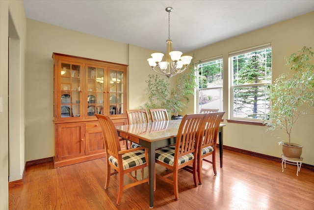 2716 S Man O War Ln, Veradale, WA 99037 - dining space with a chandelier and light wood-style floors