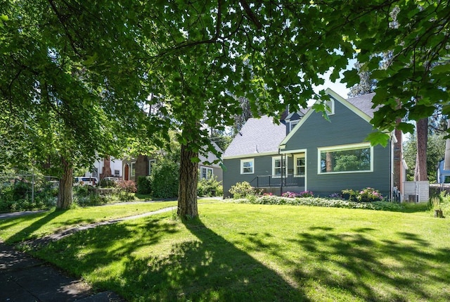 1123 W 25th Ave, Spokane, WA 99203 - view of front facade with a front yard and roof with shingles