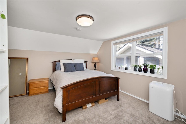 1123 W 25th Ave, Spokane, WA 99203 - carpeted bedroom with lofted ceiling and baseboards