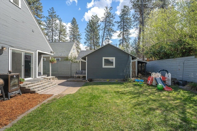 1123 W 25th Ave, Spokane, WA 99203 - view of green lawn featuring a patio area