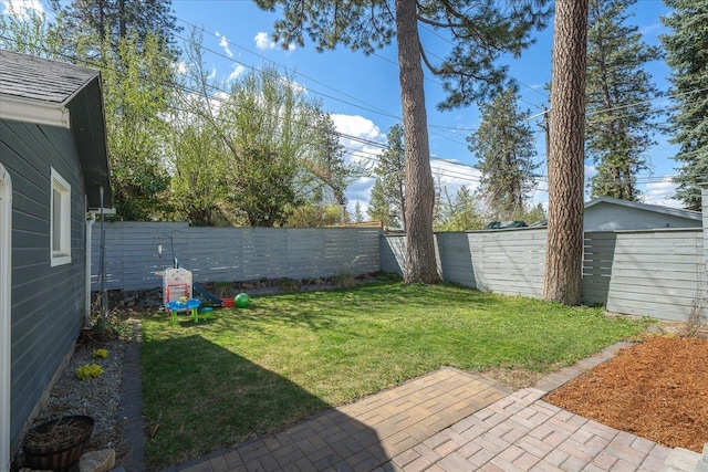 1123 W 25th Ave, Spokane, WA 99203 - fenced backyard featuring a patio area