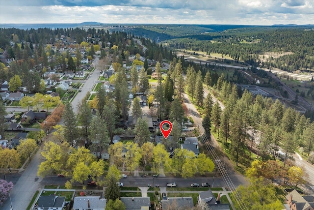1123 W 25th Ave, Spokane, WA 99203 - aerial view of property and surrounding area with a forest and nearby suburban area
