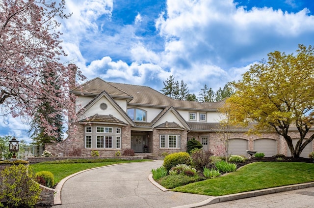 1714 E S Ridge Dr, Spokane, WA 99223 - view of front of property with a front lawn and brick siding