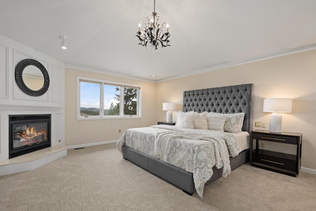 1714 E S Ridge Dr, Spokane, WA 99223 - bedroom with light colored carpet, a chandelier, a fireplace, and crown molding