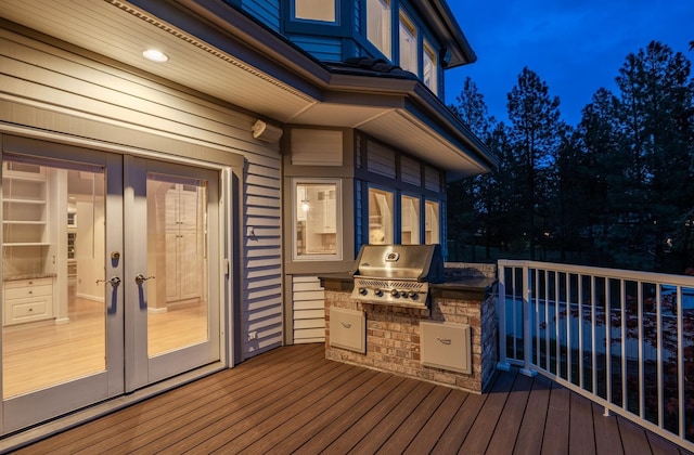 1714 E S Ridge Dr, Spokane, WA 99223 - wooden deck featuring an outdoor kitchen and french doors