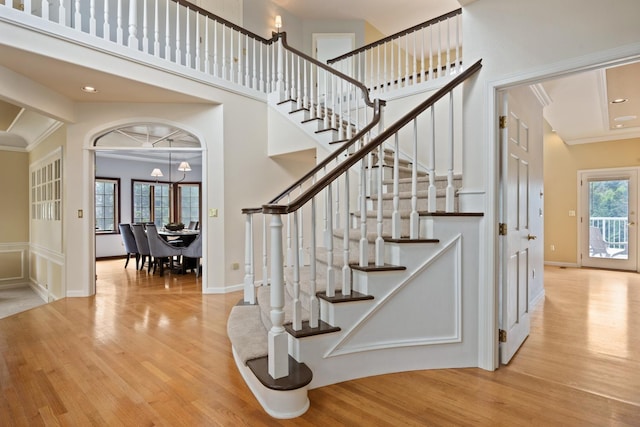 1714 E S Ridge Dr, Spokane, WA 99223 - stairway with wood finished floors, ornamental molding, and recessed lighting