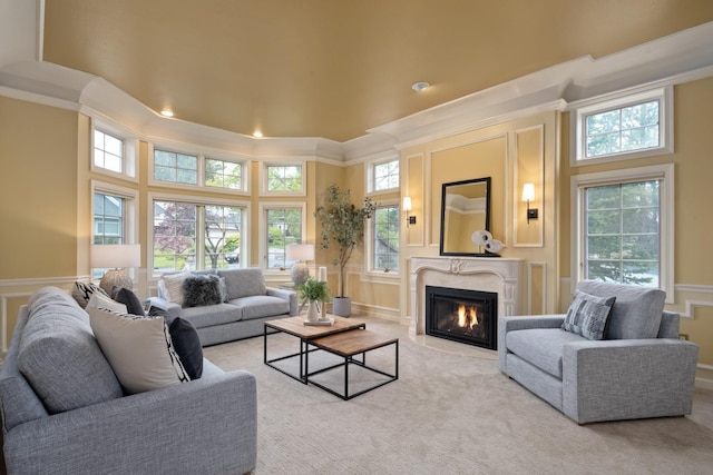 1714 E S Ridge Dr, Spokane, WA 99223 - living room with a decorative wall, crown molding, plenty of natural light, a high end fireplace, and a towering ceiling
