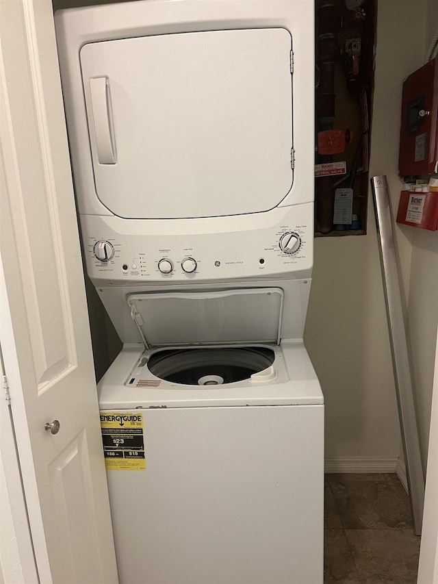 360 E 7th Ave # B, Colville, WA 99114 - washroom with stacked washer / dryer and baseboards