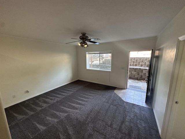 360 E 7th Ave # B, Colville, WA 99114 - unfurnished room with dark carpet and ceiling fan