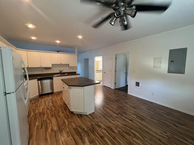 360 E 7th Ave # B, Colville, WA 99114 - kitchen with freestanding refrigerator, dishwasher, electric panel, dark countertops, and a kitchen island