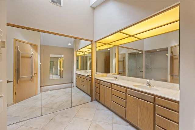 5430 S Quail Ridge Cir, Spokane, WA 99223 - bathroom featuring double vanity, a shower stall, and tile patterned floors