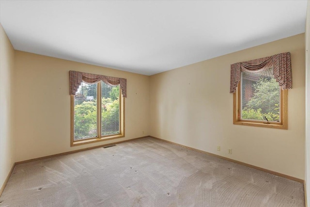 5430 S Quail Ridge Cir, Spokane, WA 99223 - unfurnished room with light colored carpet and baseboards