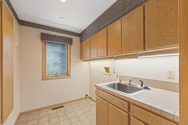5430 S Quail Ridge Cir, Spokane, WA 99223 - laundry room with hookup for a washing machine and cabinet space