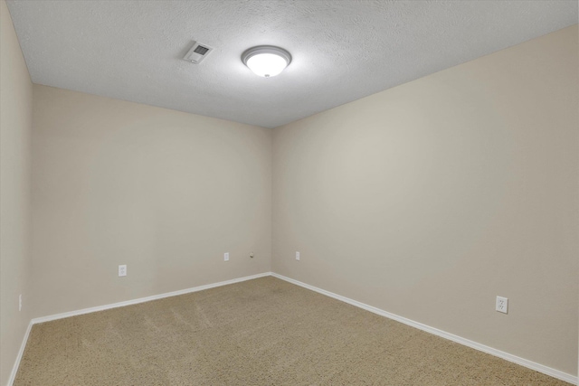 15418 E 24th Ave, Spokane Valley, WA 99037 - empty room featuring carpet floors and a textured ceiling