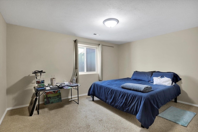 15418 E 24th Ave, Spokane Valley, WA 99037 - carpeted bedroom with baseboards and a textured ceiling