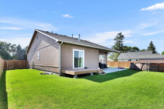 15418 E 24th Ave, Spokane Valley, WA 99037 - back of house with a fenced backyard, a patio area, and roof with shingles