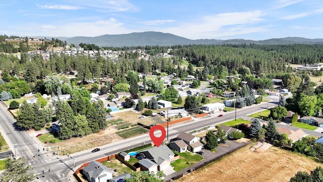15418 E 24th Ave, Spokane Valley, WA 99037 - aerial view of residential area with a mountainous background and a forest