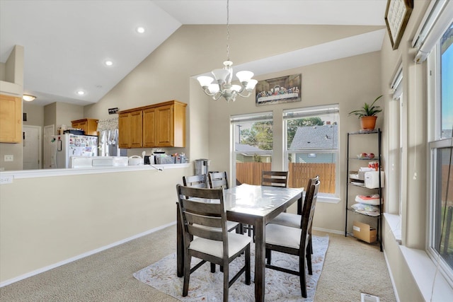 15418 E 24th Ave, Spokane Valley, WA 99037 - dining space featuring light carpet, a chandelier, high vaulted ceiling, and recessed lighting