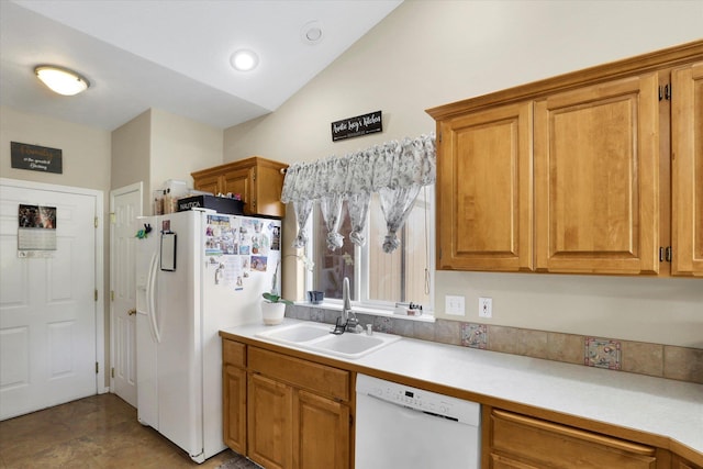 15418 E 24th Ave, Spokane Valley, WA 99037 - kitchen with white appliances, light countertops, brown cabinets, vaulted ceiling, and recessed lighting
