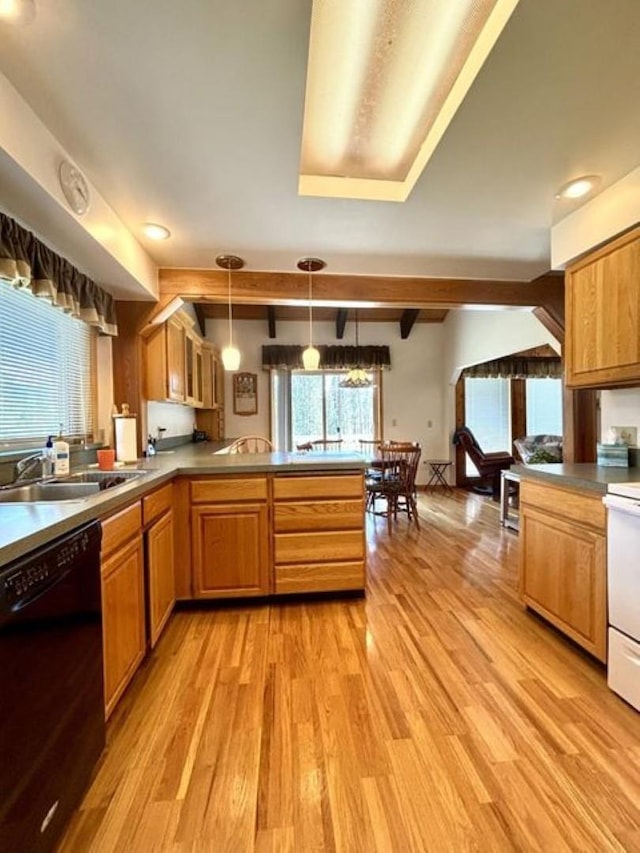 1425 N Chapin Rd, Evans, WA 99126 - kitchen with dishwasher, light wood-type flooring, a peninsula, beam ceiling, and range