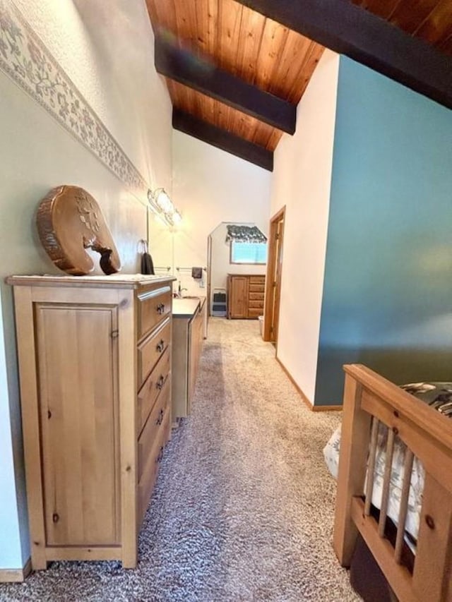 1425 N Chapin Rd, Evans, WA 99126 - bedroom featuring a wooden ceiling with exposed beams, light colored carpet, and high vaulted ceiling