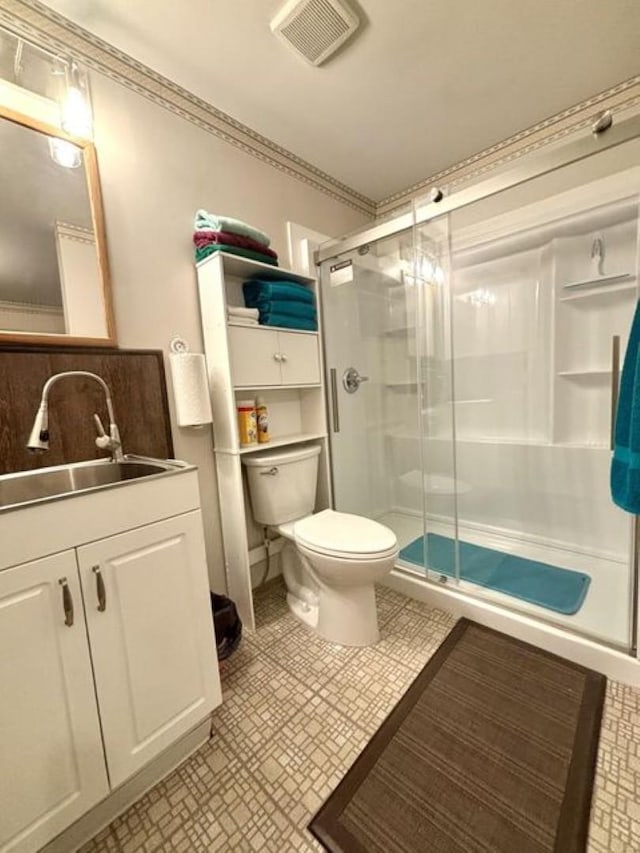 1425 N Chapin Rd, Evans, WA 99126 - bathroom with a shower stall, vanity, and ornamental molding