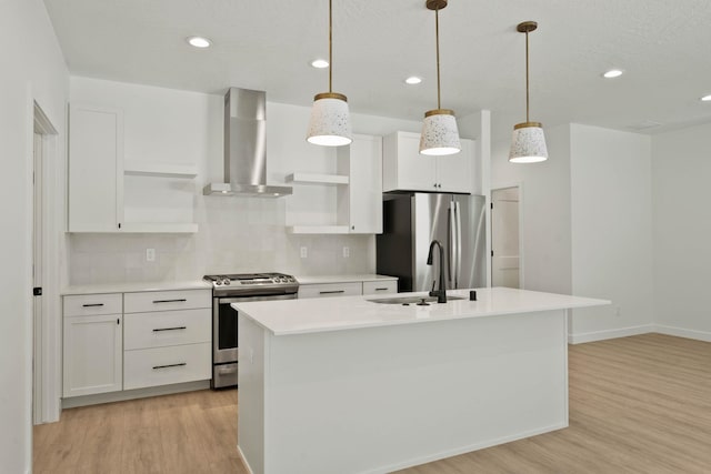 1215 S Radio Ln, Spokane Valley, WA 99212 - kitchen with open shelves, stainless steel appliances, wall chimney exhaust hood, light wood-style flooring, and recessed lighting