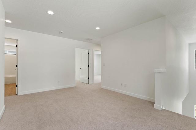 1215 S Radio Ln, Spokane Valley, WA 99212 - unfurnished room with light carpet and recessed lighting