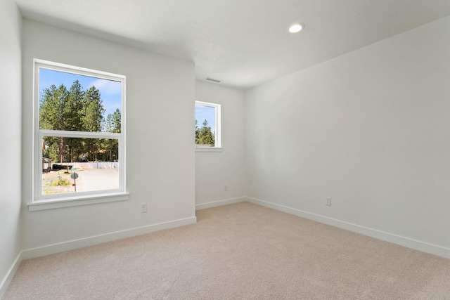1215 S Radio Ln, Spokane Valley, WA 99212 - empty room featuring light carpet and recessed lighting