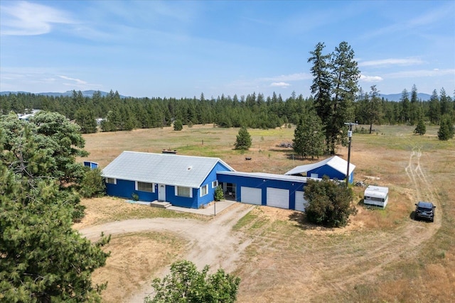 40010 N Newport Hwy, Elk, WA 99009 - view of subject property featuring a mountain backdrop and a heavily wooded area