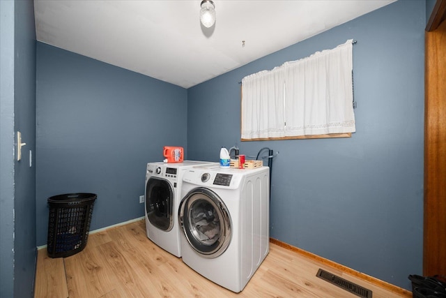40010 N Newport Hwy, Elk, WA 99009 - laundry area with light wood-style floors and independent washer and dryer