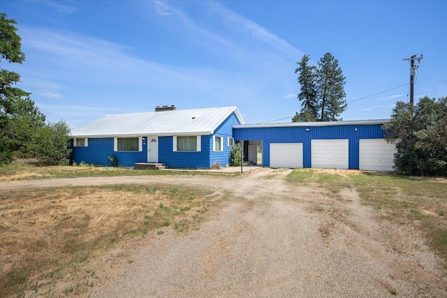 40010 N Newport Hwy, Elk, WA 99009 - single story home with a chimney, a garage, and an outbuilding
