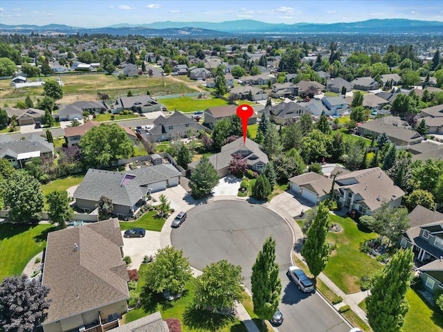 3405 W Kens Ct, Spokane, WA 99208 - aerial view of residential area with a mountain backdrop