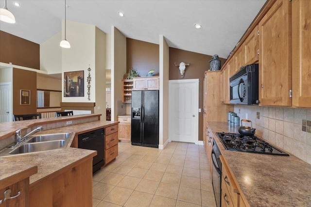 3405 W Kens Ct, Spokane, WA 99208 - kitchen featuring black appliances, tasteful backsplash, light tile patterned floors, decorative light fixtures, and high vaulted ceiling