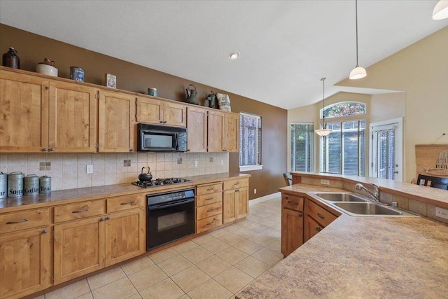 3405 W Kens Ct, Spokane, WA 99208 - kitchen featuring black appliances, light tile patterned floors, tasteful backsplash, pendant lighting, and lofted ceiling
