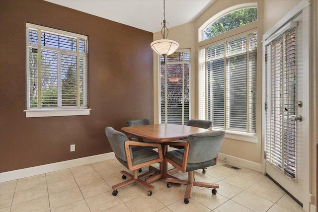 3405 W Kens Ct, Spokane, WA 99208 - tiled dining room featuring baseboards