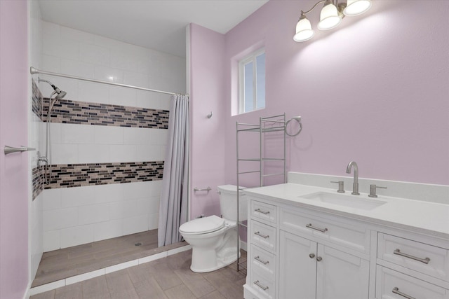 403 N Calvin Ln, Spokane Valley, WA 99216 - full bath with tiled shower, vanity, and wood finished floors