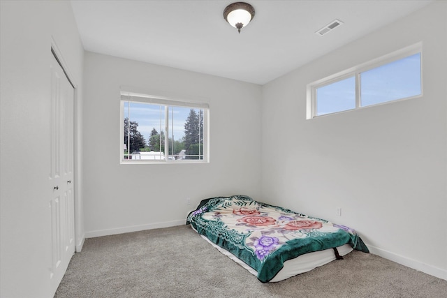 403 N Calvin Ln, Spokane Valley, WA 99216 - carpeted bedroom featuring baseboards and a closet
