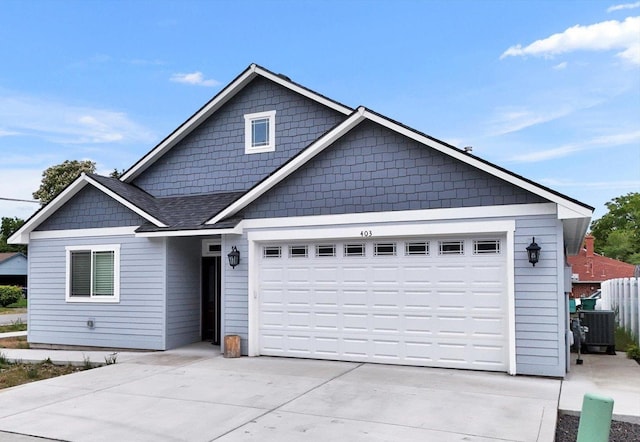 403 N Calvin Ln, Spokane Valley, WA 99216 - view of front of house with driveway and a garage