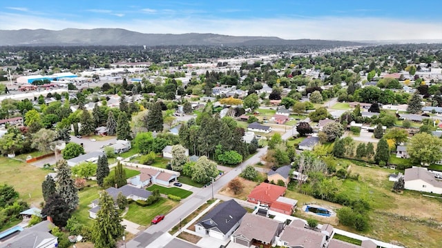 403 N Calvin Ln, Spokane Valley, WA 99216 - aerial perspective of suburban area with a mountain backdrop