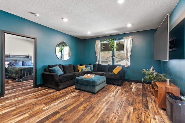3228 N Mckinnon Rd, Spokane, WA 99217 - living room with hardwood / wood-style floors, a textured ceiling, and recessed lighting