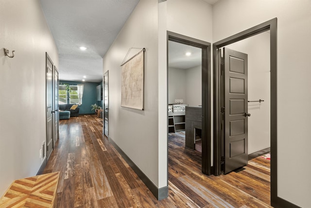 3228 N Mckinnon Rd, Spokane, WA 99217 - hallway featuring dark wood-type flooring and recessed lighting