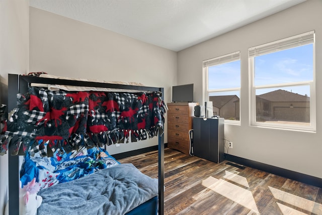 3228 N Mckinnon Rd, Spokane, WA 99217 - bedroom with wood finished floors and baseboards