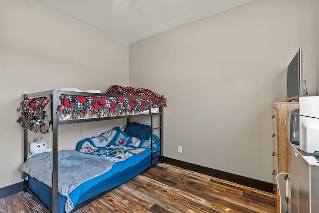 3228 N Mckinnon Rd, Spokane, WA 99217 - bedroom featuring wood finished floors and baseboards
