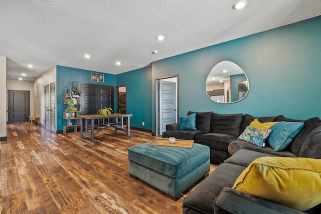 3228 N Mckinnon Rd, Spokane, WA 99217 - living room featuring hardwood / wood-style flooring, recessed lighting, and a textured ceiling