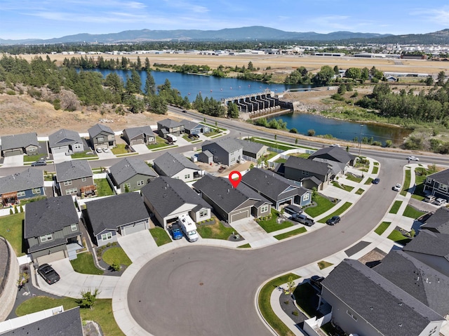 3228 N Mckinnon Rd, Spokane, WA 99217 - aerial overview of property's location with a water and mountain view and nearby suburban area