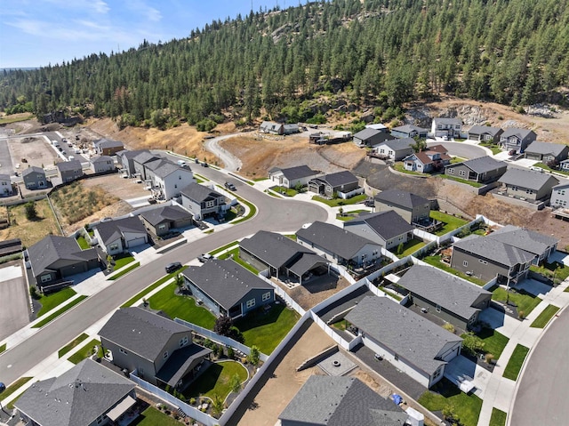 3228 N Mckinnon Rd, Spokane, WA 99217 - aerial overview of property's location featuring a heavily wooded area and nearby suburban area