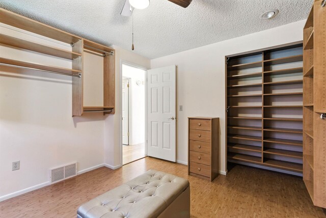3832 S Cook St, Spokane, WA 99223 - walk in closet featuring light wood-style flooring and ceiling fan